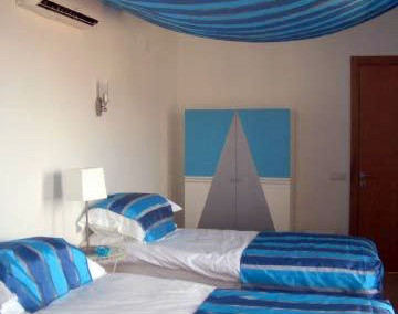 Turquoise twin room Villa Vanilla